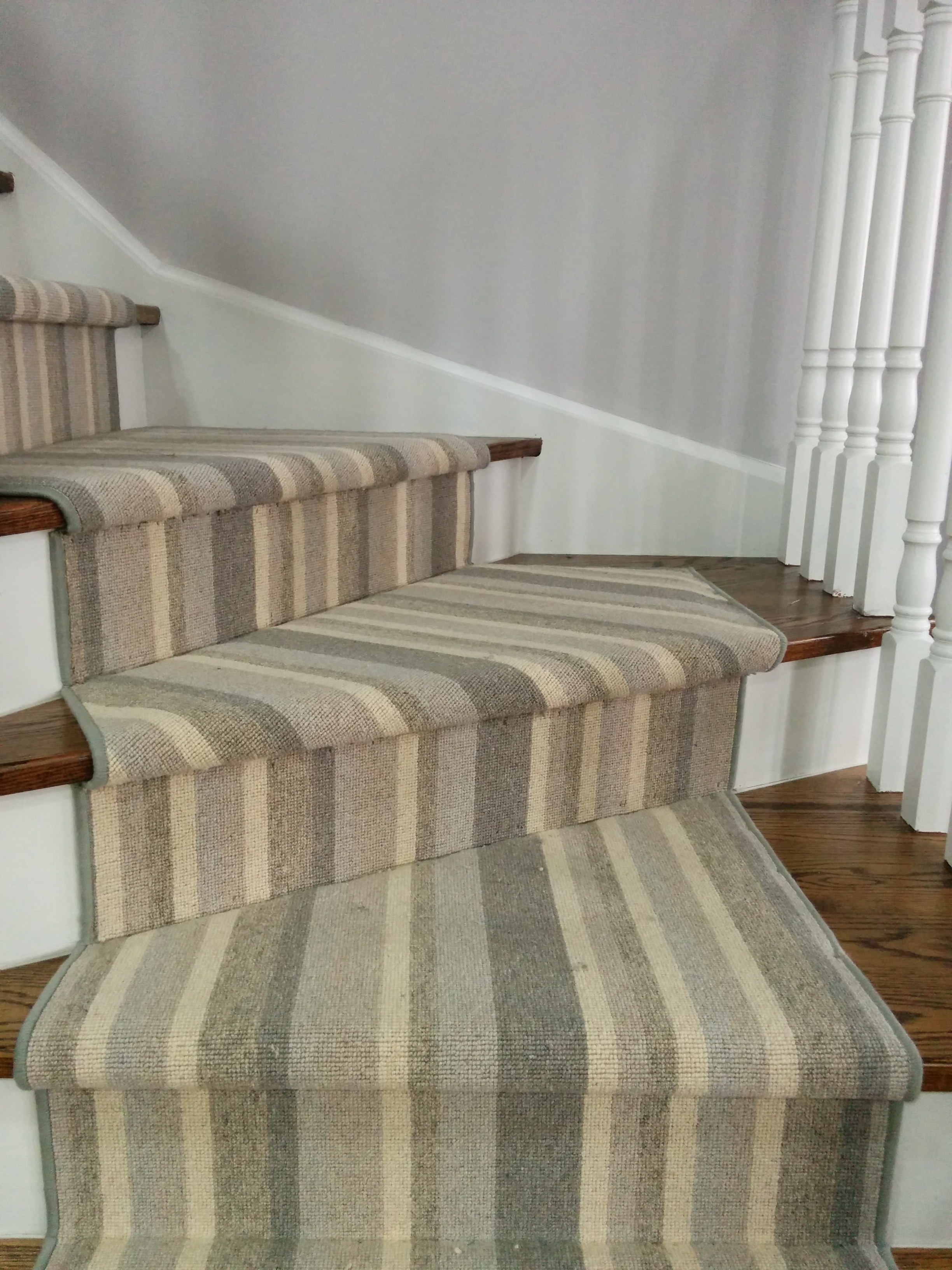 Grey colour striped carpet for stairs runner on pie staircase in Toronto
