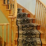 black carpet runner on stairs